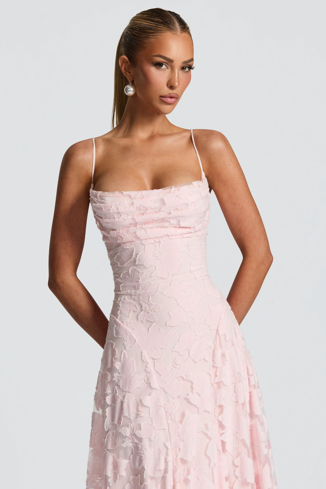 Full-length pink floral maxi dress with draped cowl neckline