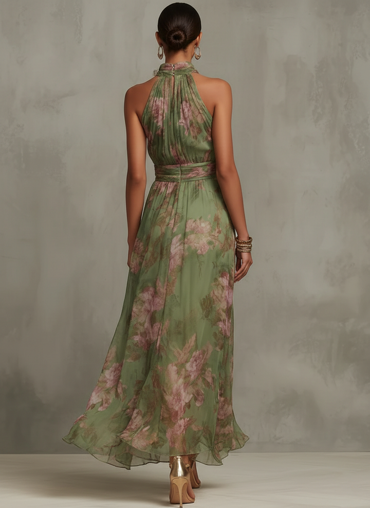 Back view of green halter maxi dress with pink floral pattern