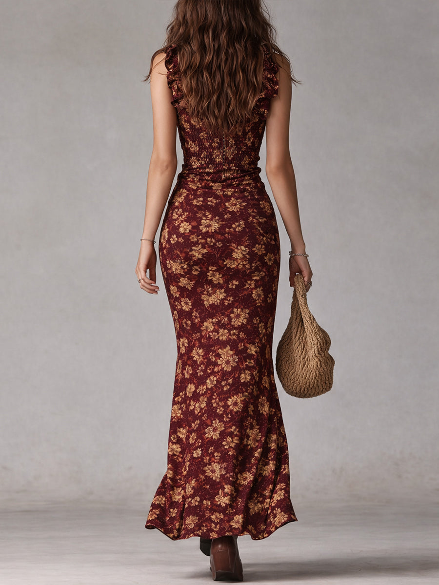 Back view of burgundy floral maxi dress with sleeveless fit and ankle-length hem