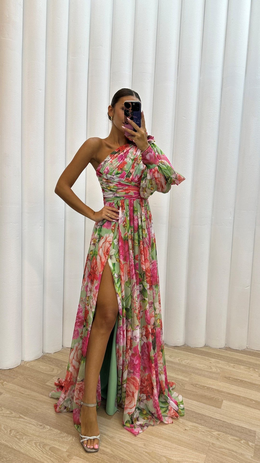 Floral maxi dress with asymmetric one shoulder and voluminous puff sleeve detail