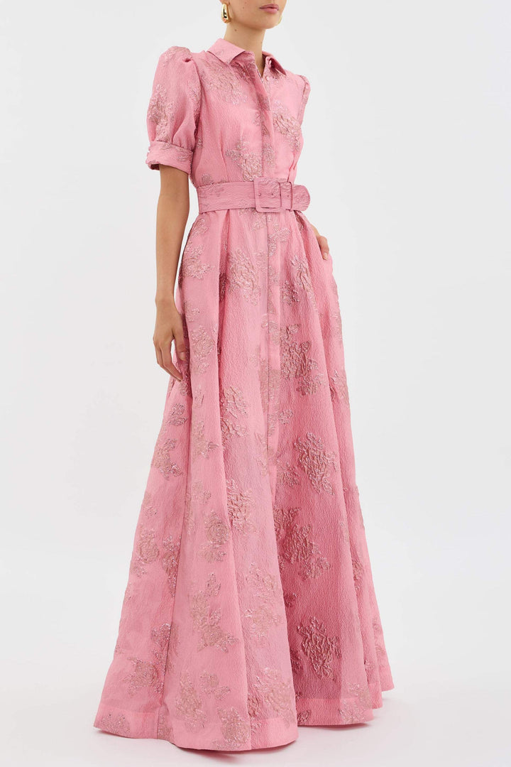 Side view of pink floral maxi dress showing belted waist and long A-line skirt