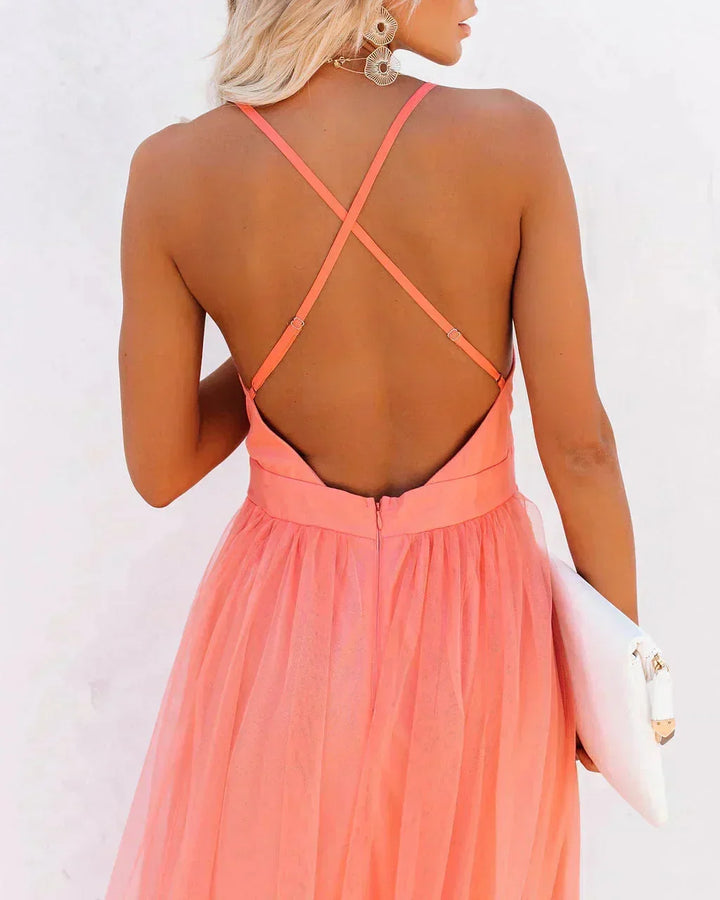 Robe longue fluide orange, dos nu, bretelles fines, idéale pour les soirées d&