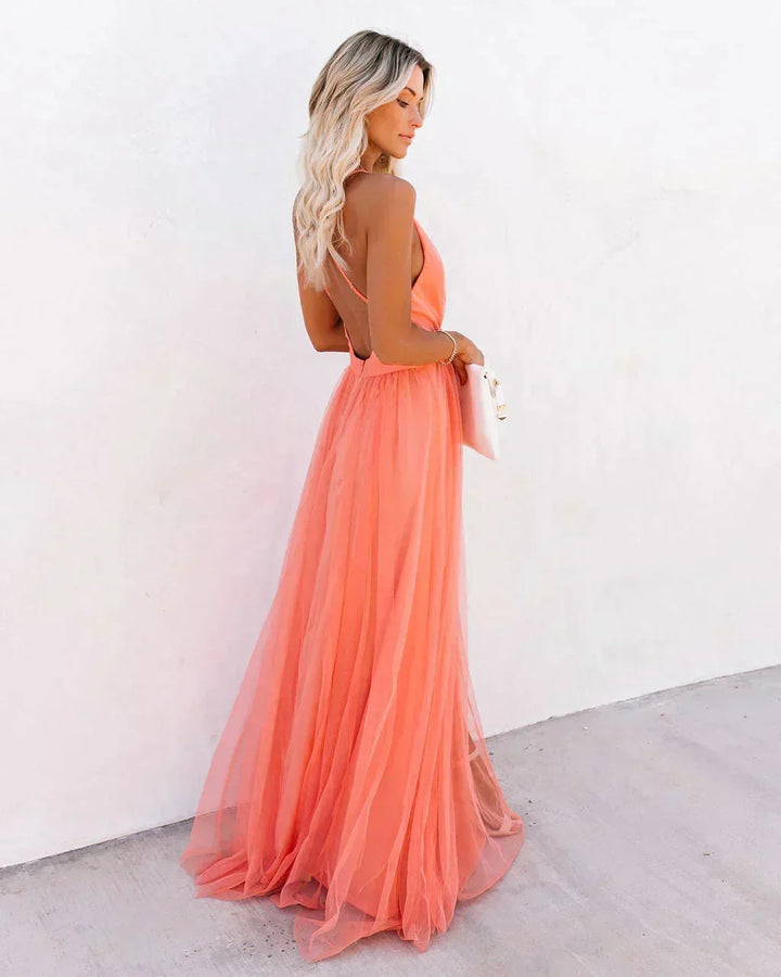 Robe longue fluide orange, dos nu avec bretelles fines, parfaite pour les soirées d&