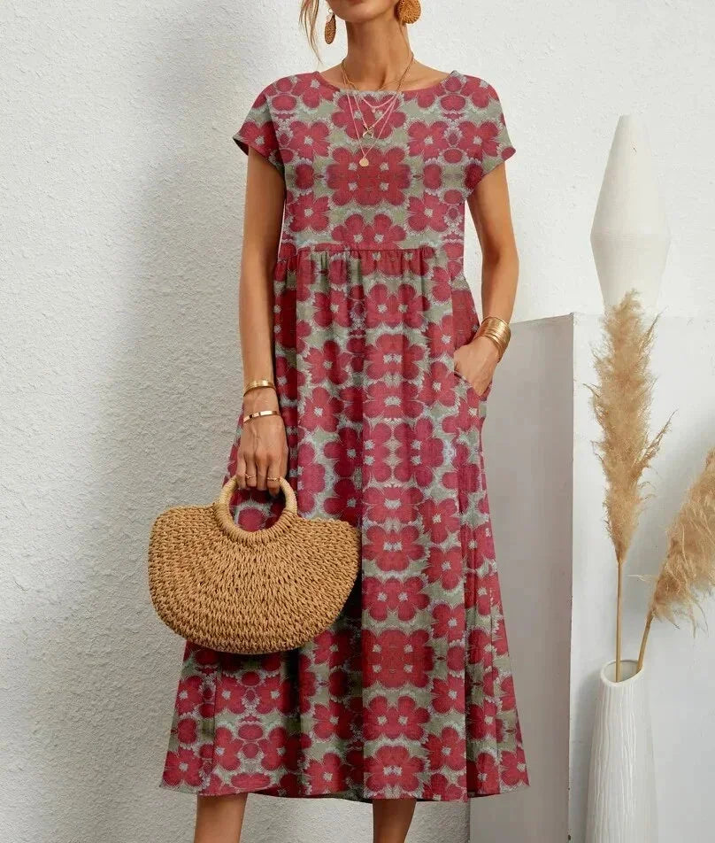 Robe midi en coton rouge avec un imprimé floral et poches, idéale pour le printemps et l&