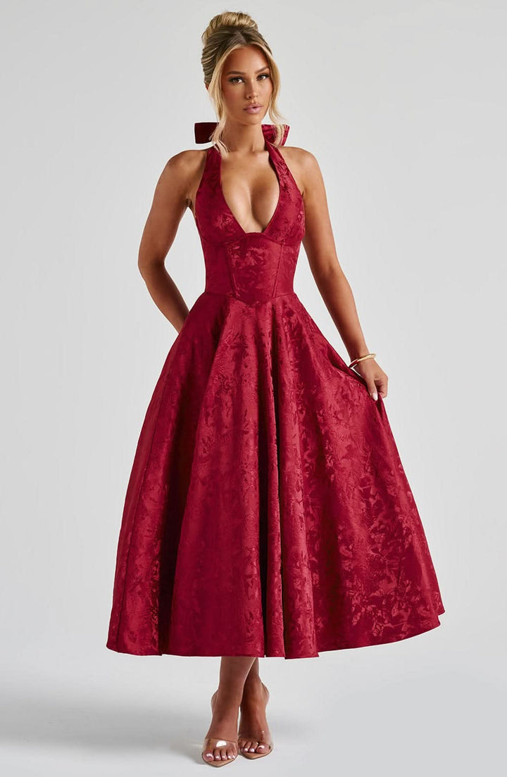 Deep burgundy velvet halter midi dress with full skirt