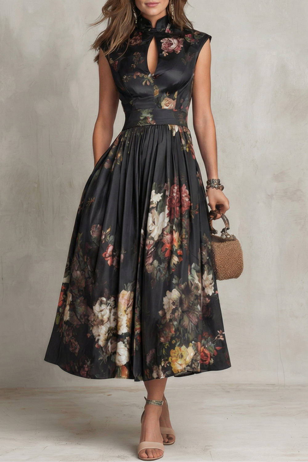 Front view of black floral midi dress with high neckline and sleeveless wedding guest style