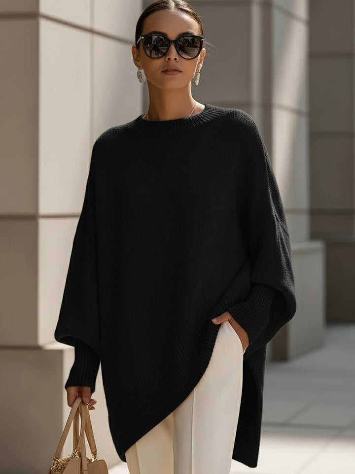 Damen Poncho aus Strick mit breitem Rippsaum