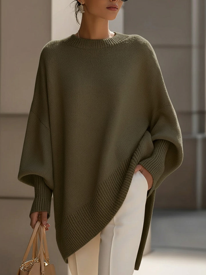 Damen Poncho aus Strick mit breitem Rippsaum