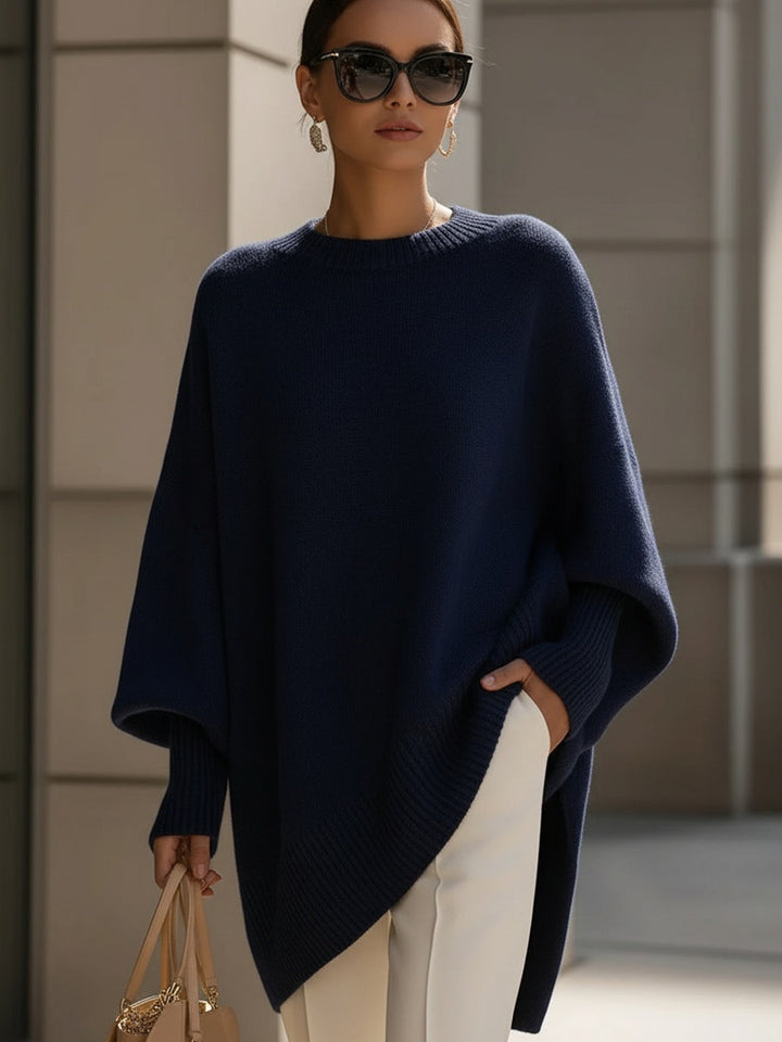 Damen Poncho aus Strick mit breitem Rippsaum
