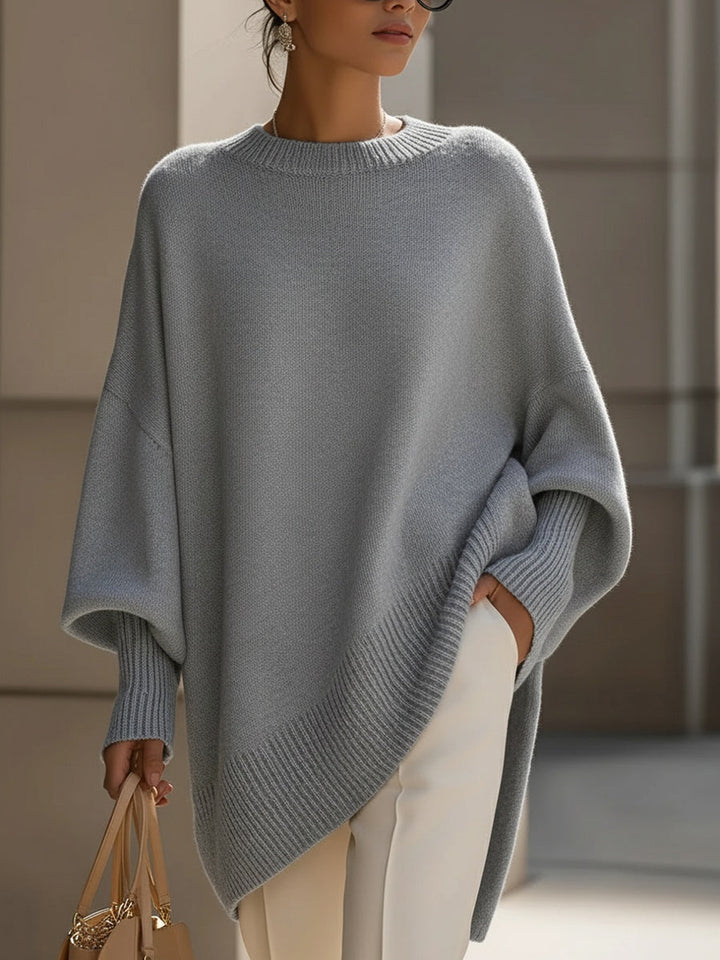 Damen Poncho aus Strick mit breitem Rippsaum