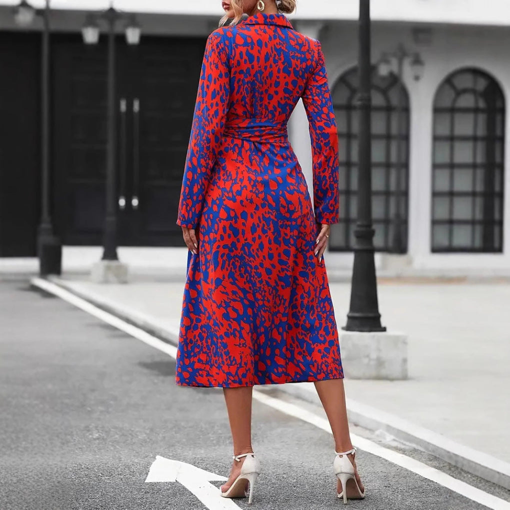 Back view of red and blue leopard print wrap midi dress with slit hem