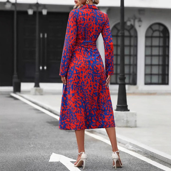 Back view of red and blue leopard print wrap midi dress with slit hem