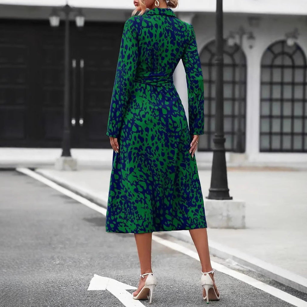 Back view of green and navy leopard print wrap midi dress showing slit