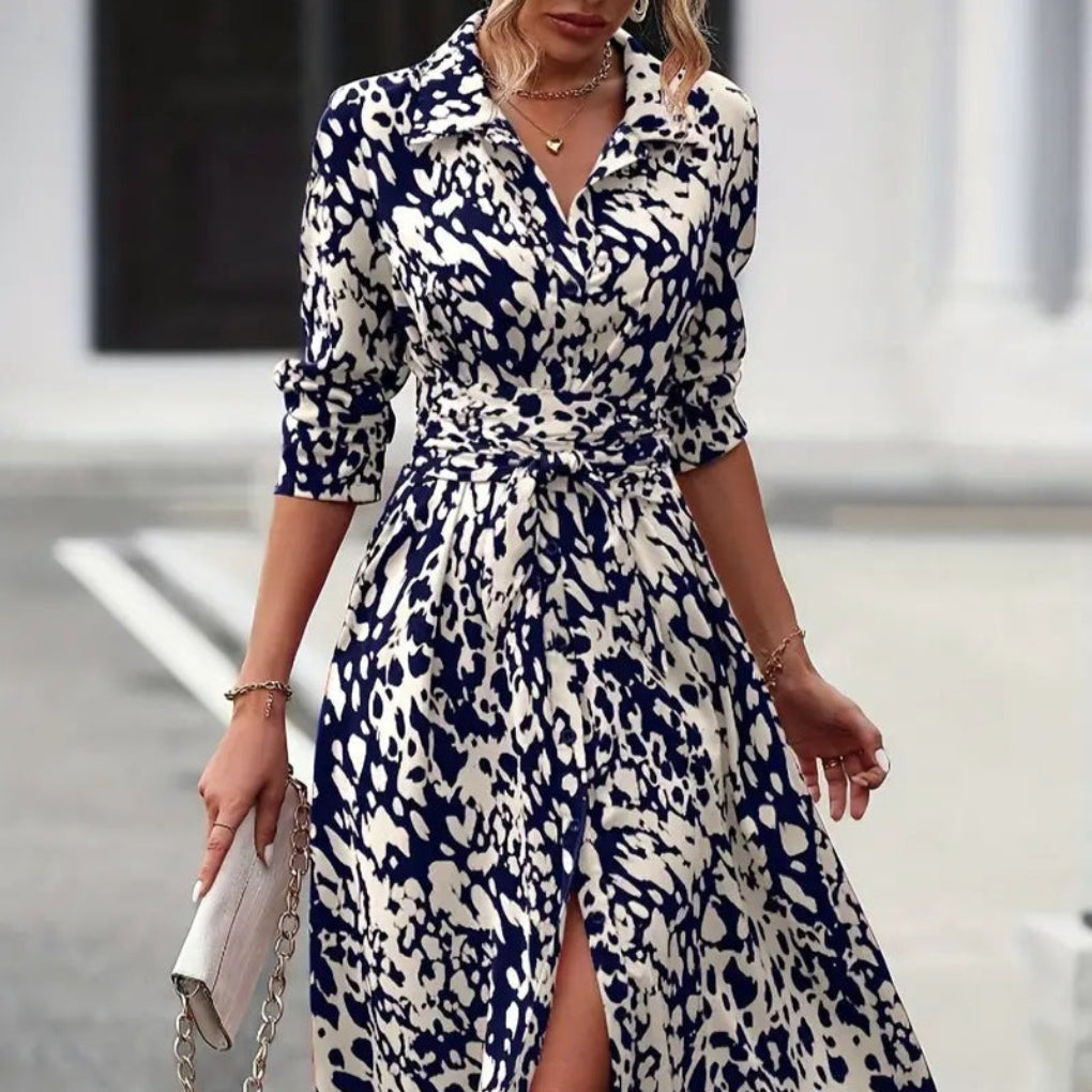 Navy and cream leopard print wrap midi dress with half sleeves and tie closure