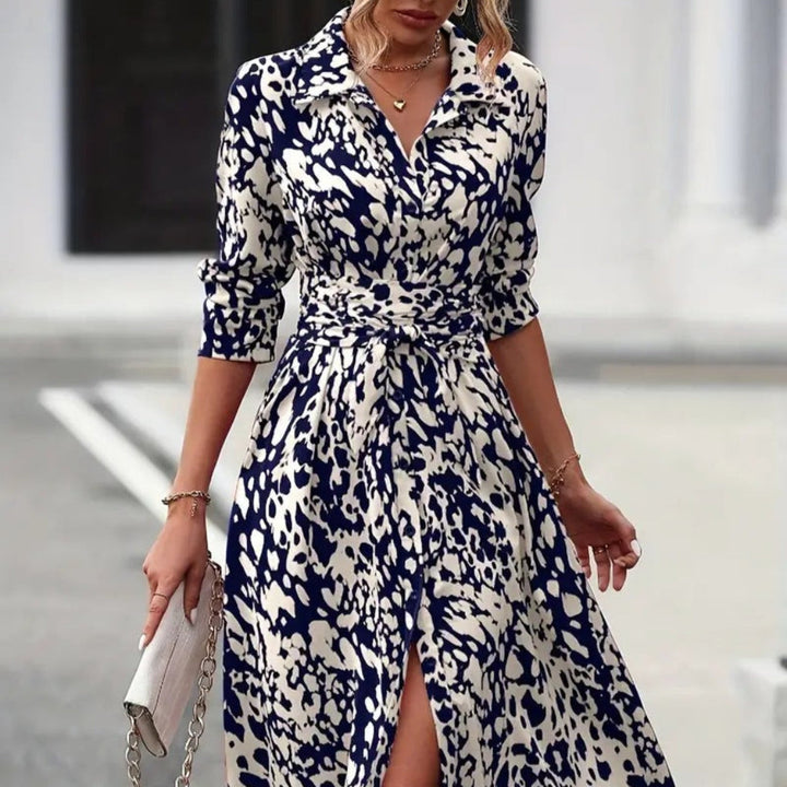 Navy and cream leopard print wrap midi dress with half sleeves and tie closure