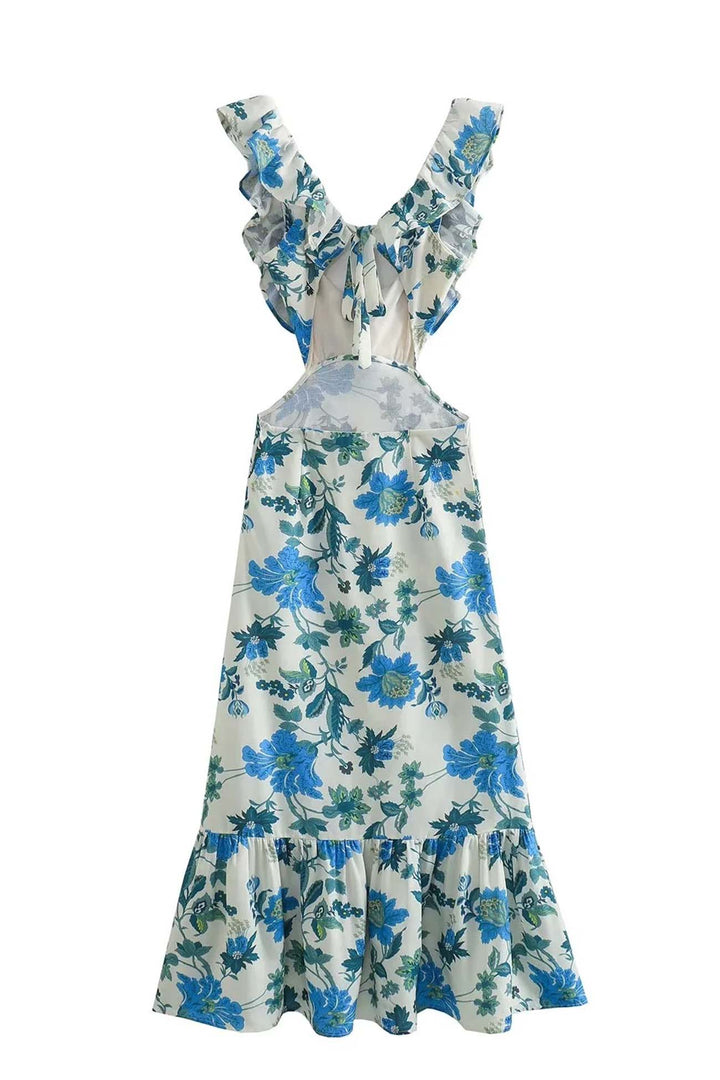 Back of blue floral V neck maxi dress showing open back and tie detail on white