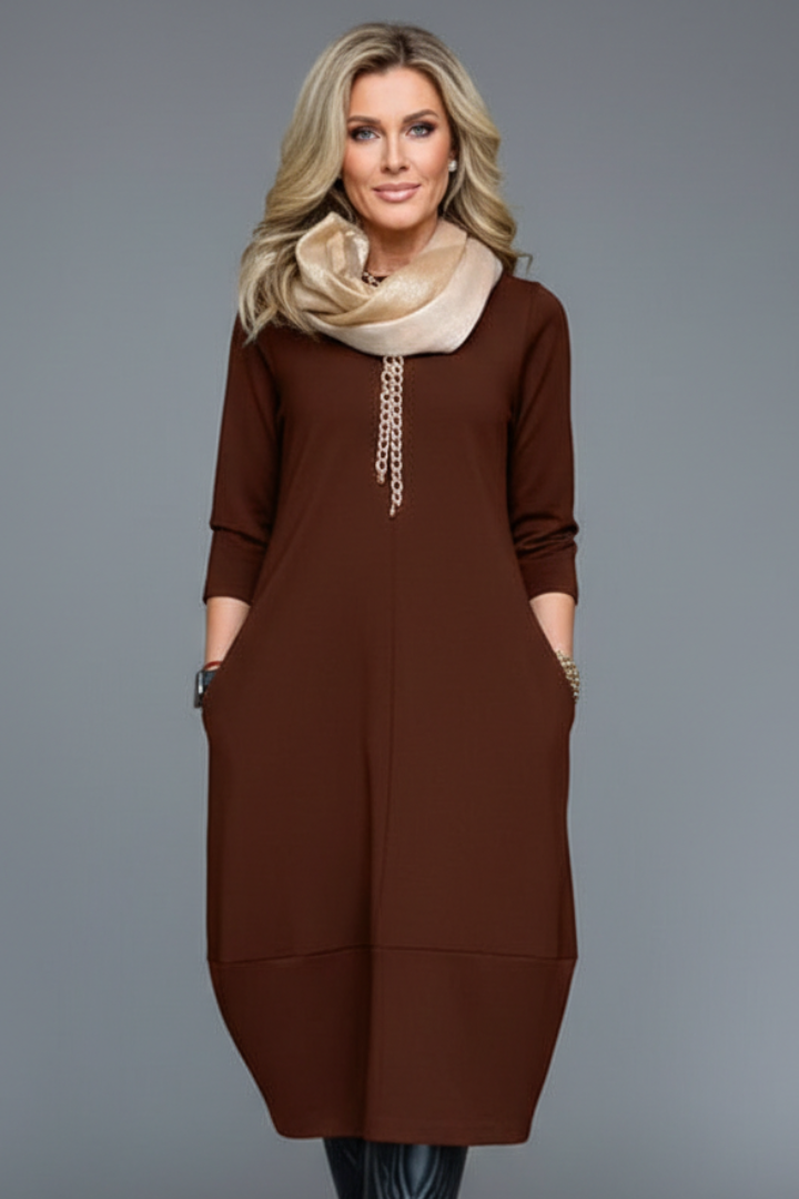 Damen Strickkleid mit Taschen und Ballonsaum