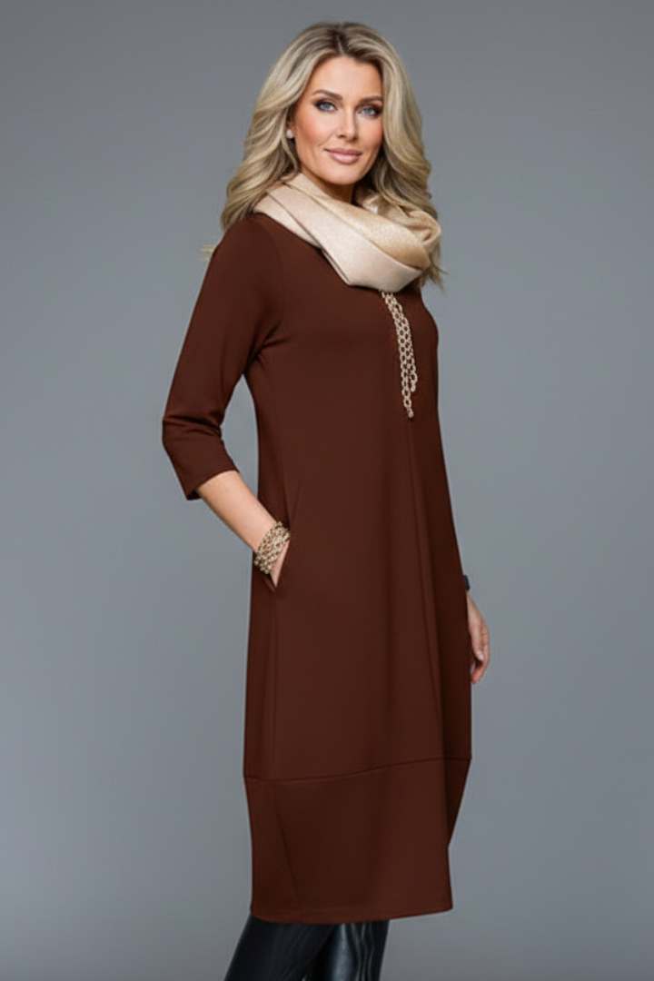 Damen Strickkleid mit Taschen und Ballonsaum