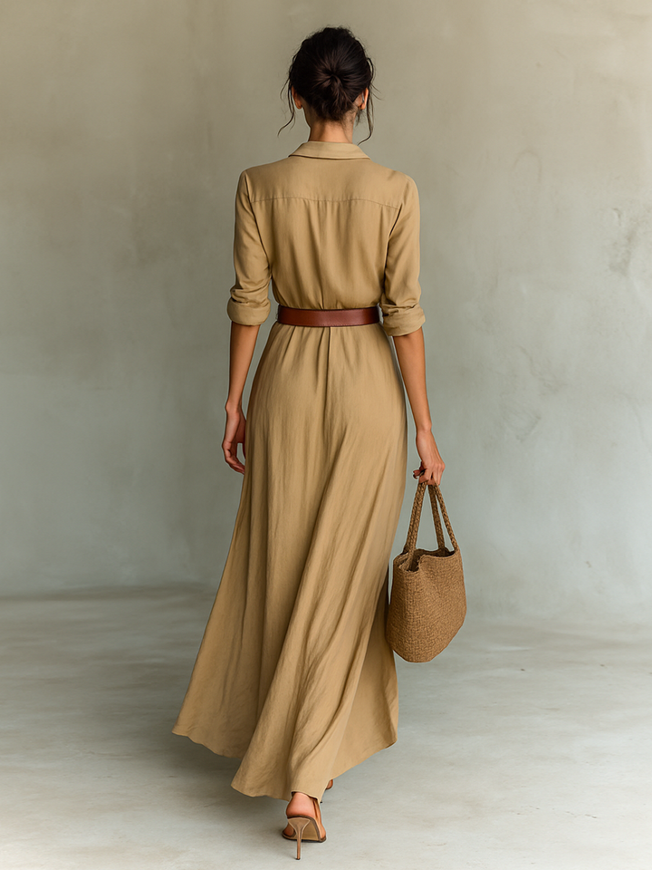 Back view of beige long sleeve maxi dress with brown belt