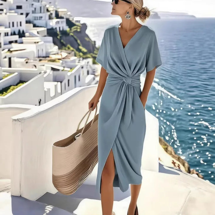 Robe midi femme, décolleté V, coupe croisée nouée à la taille, manches courtes.