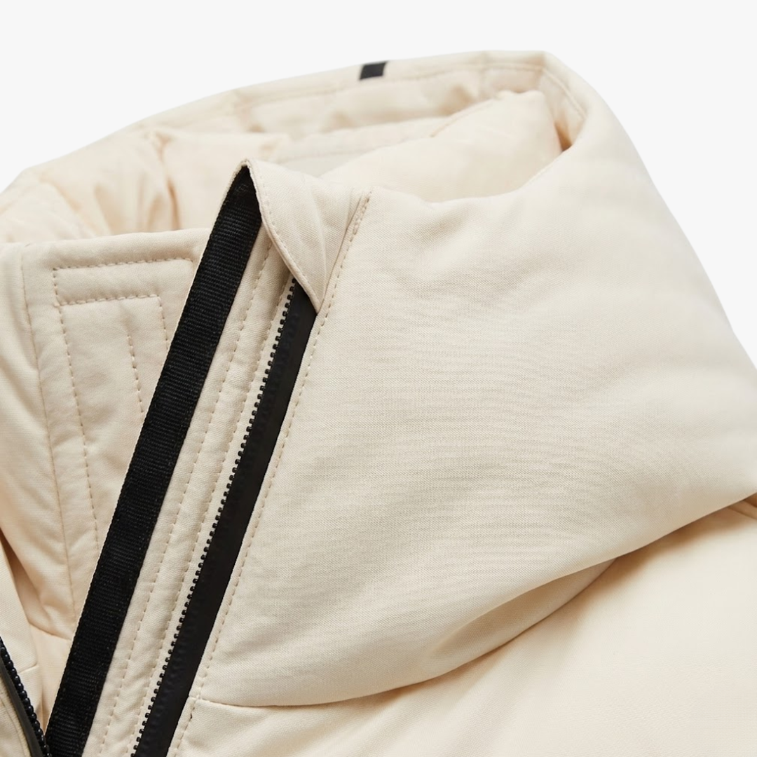 Damen Winterjacke mit Kapuze und gesteppter Saumpartie