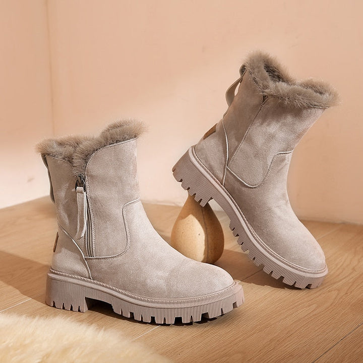 Damen Winterstiefel mit Plüschbesatz und Reissverschluss